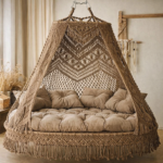 Macramé hanging daybed close-up with intricate cotton rope knots and beige cushions