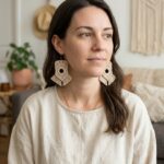 Handmade macrame tassel earrings with gold hooks in boho style