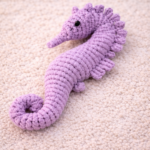 Handmade macrame seahorse toy in lavender color
