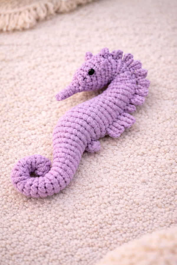 Handmade macrame seahorse toy in lavender color