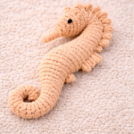 Handmade macrame seahorse toy in pastel yellow color
