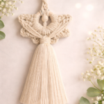 Handmade macrame angel wall hanging in beige cotton cord with tassel and wooden bead, boho spiritual decor