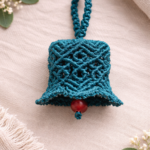 Handmade teal macrame bell hanging with red bead, boho car charm decor